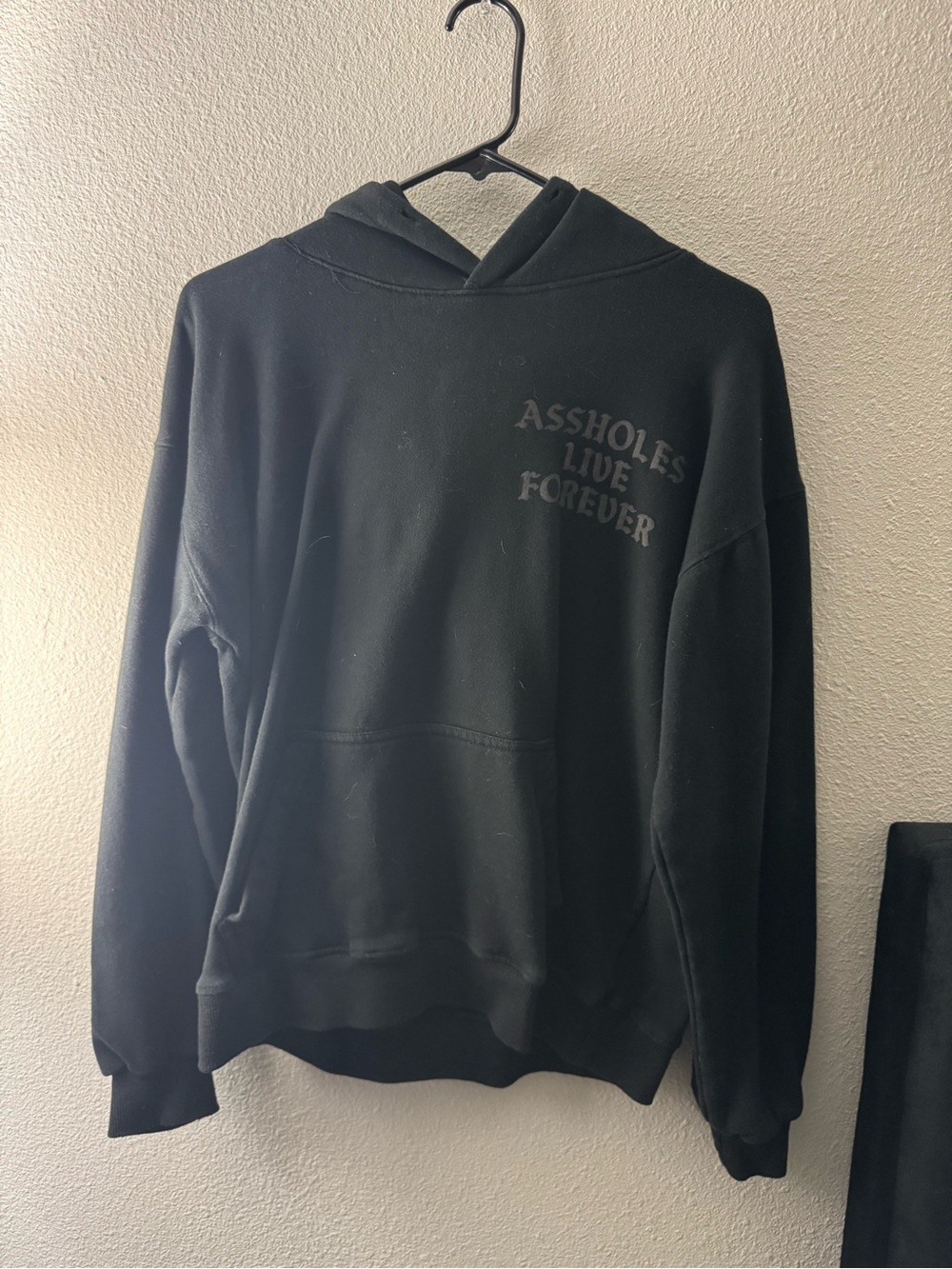 Black Pullover Hoodie with Chest Text